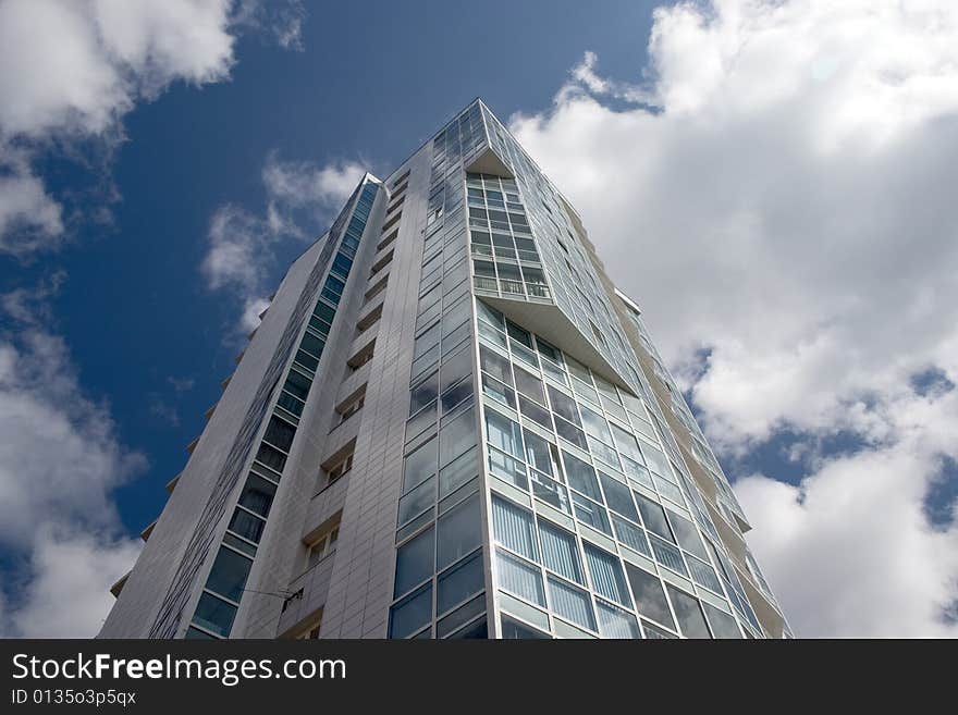 Modern urban building. Glass balconies. Modern urban building. Glass balconies.