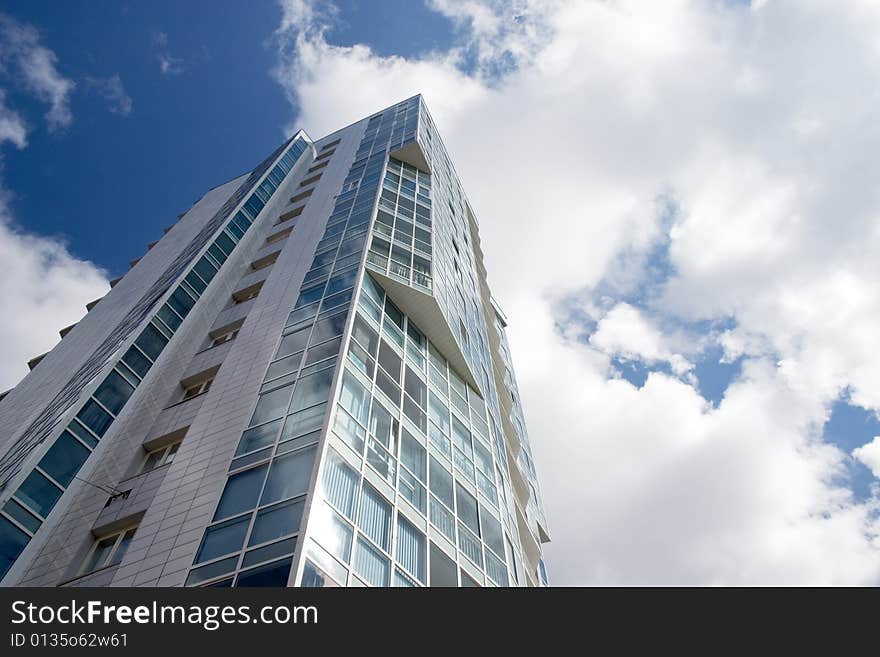 Modern urban building. Glass balconies. Modern urban building. Glass balconies.