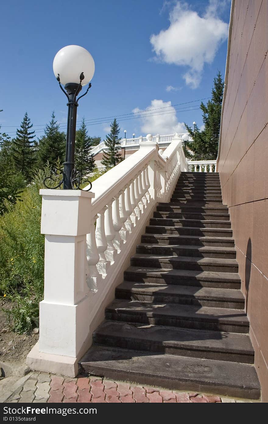 Ladder with a lantern and white balustrade. Ladder with a lantern and white balustrade.