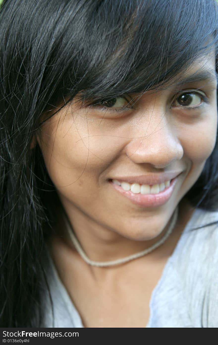 Photograph of head shot asian face