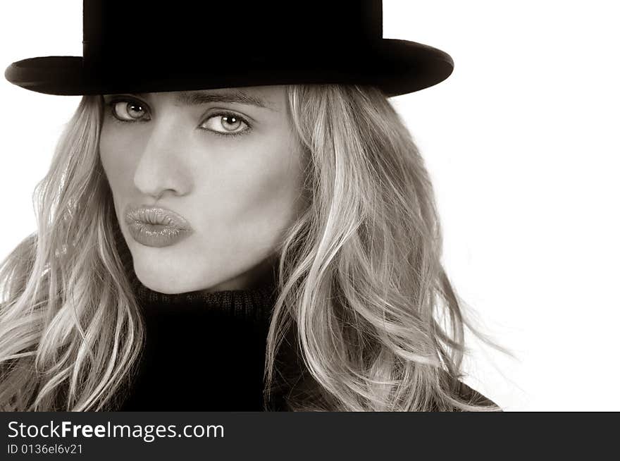 Beautiful Blond woman in Vintage bowler hat all puckered up. Beautiful Blond woman in Vintage bowler hat all puckered up