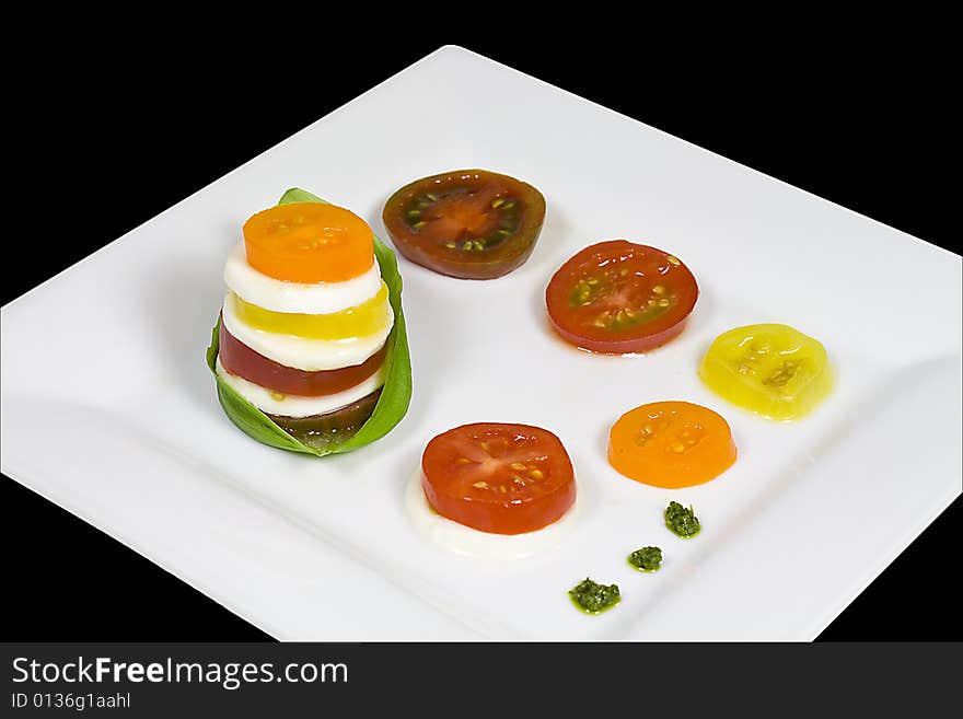 Caprese salad of five heirloom tomatoes