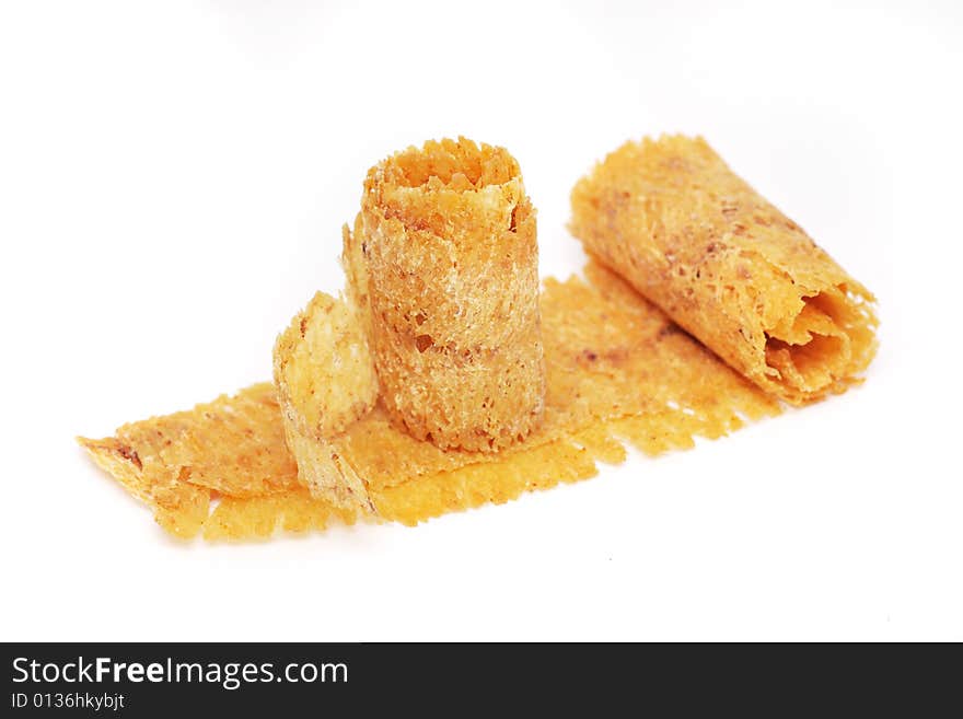 Dried and baked cuttlefish scroll on white background. Dried and baked cuttlefish scroll on white background.