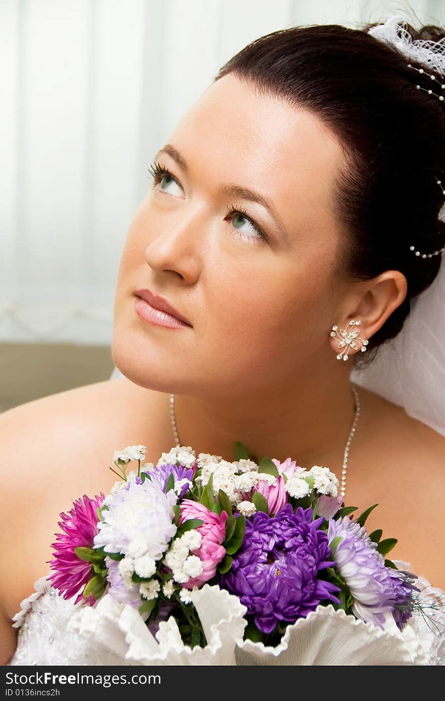 Beautiful bride with flowers