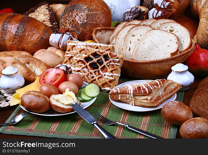 Different sorts of the bread lying on the table. Different sorts of the bread lying on the table