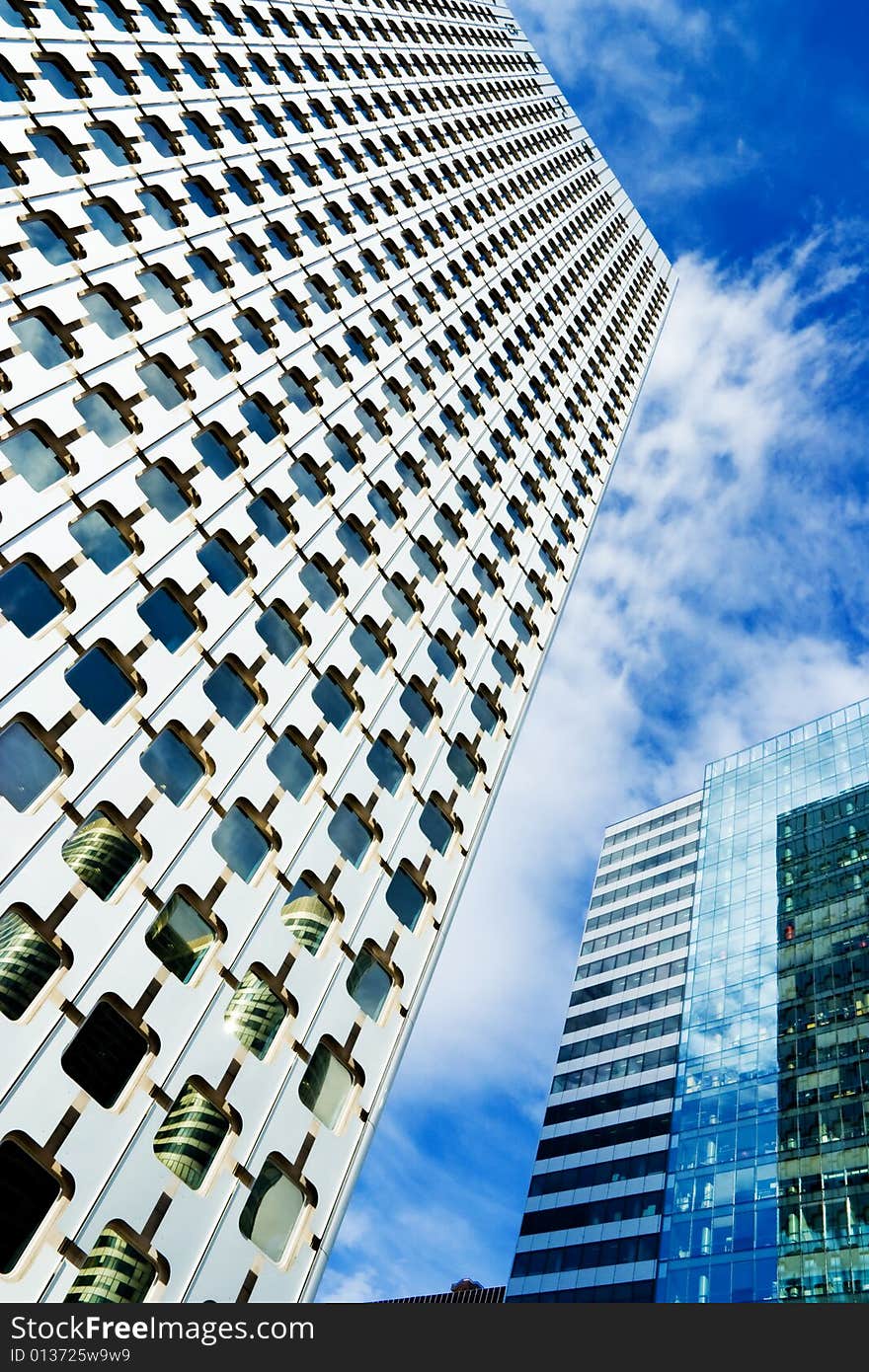 Modern buildings under blue sky. Modern buildings under blue sky