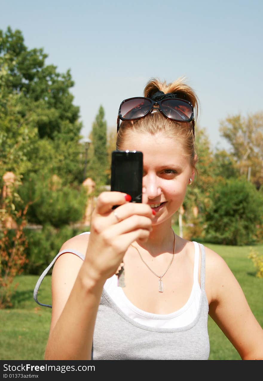 Girl with the mobile telephone