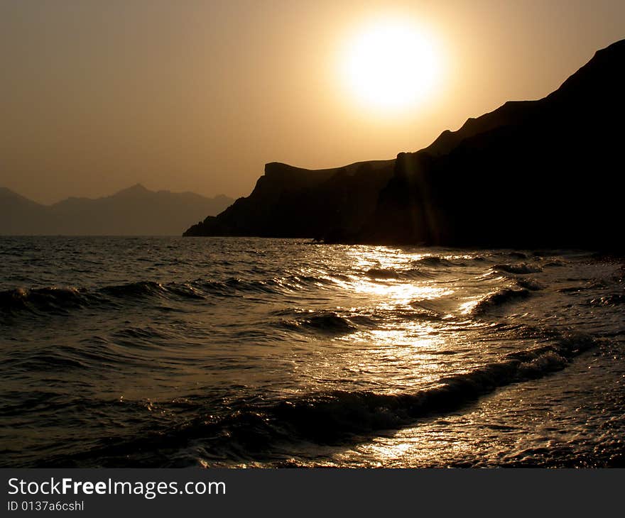 Sea sunset (the Crimea coast, summer, wave, surf, evening)