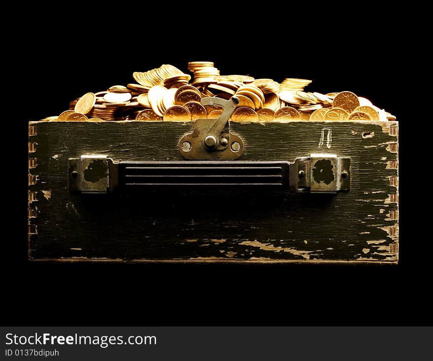 Chest full of gold isolated on black background. Chest full of gold isolated on black background.