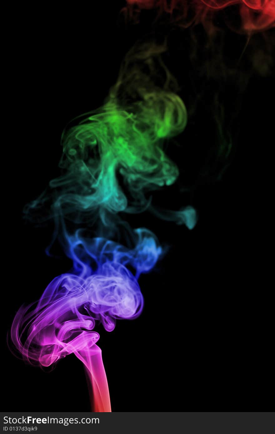 Color smoke on black background