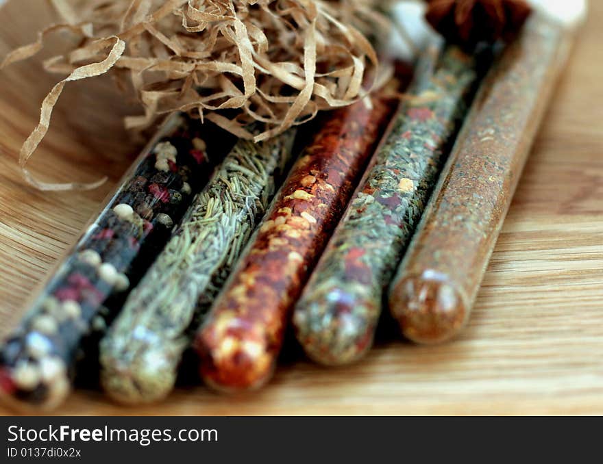 Spices in a glass on wood table. Spices in a glass on wood table