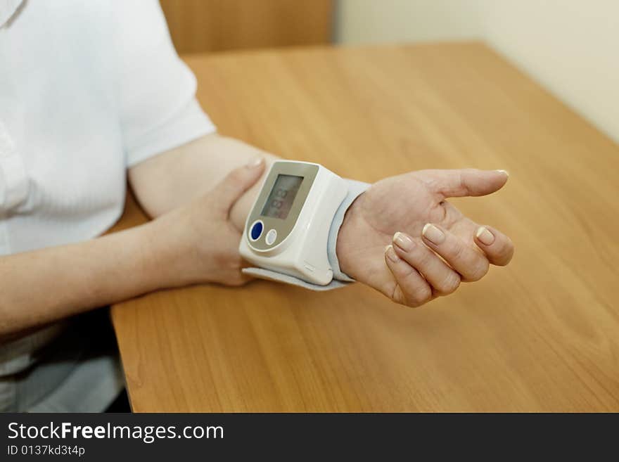 Elderly woman measures a pressure. Elderly woman measures a pressure