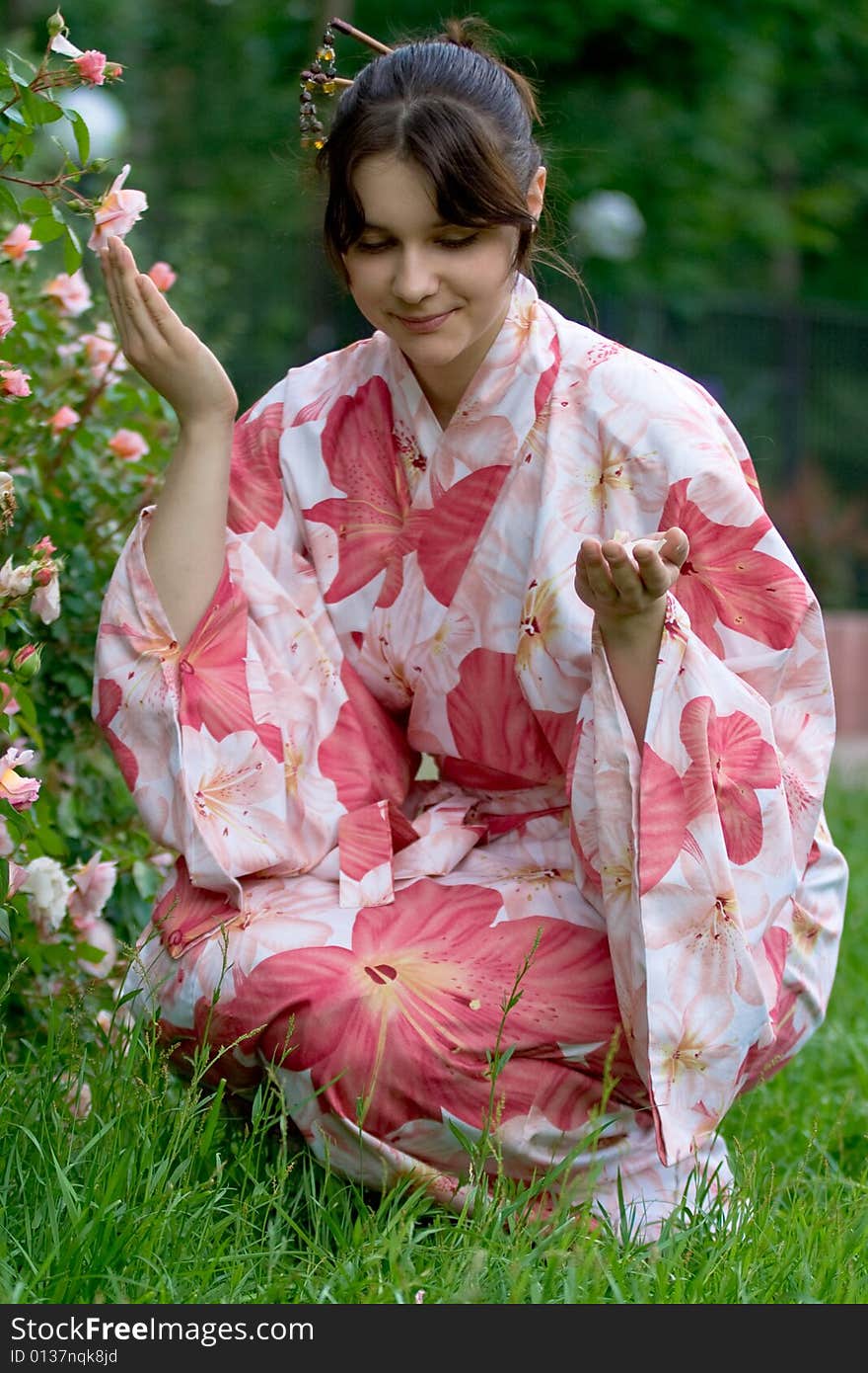 Girl in a pink yukata near floferbad. Girl in a pink yukata near floferbad