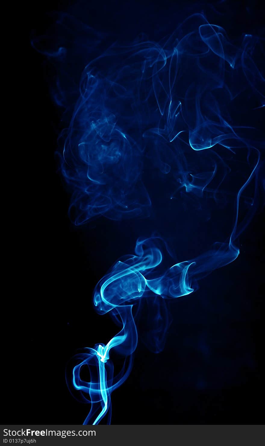 Blue smoke on black background