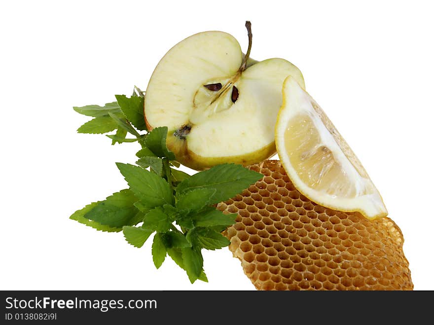 Fruits with mint and honeycomb isolated on white background. Fruits with mint and honeycomb isolated on white background