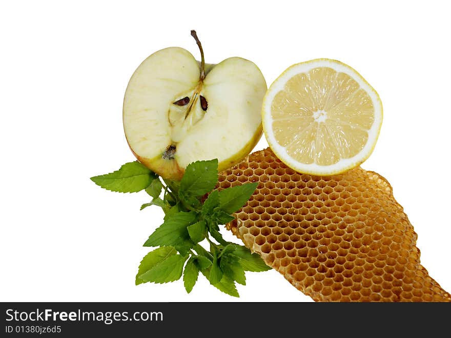 Fruits with mint and honeycomb isolated on white background. Fruits with mint and honeycomb isolated on white background