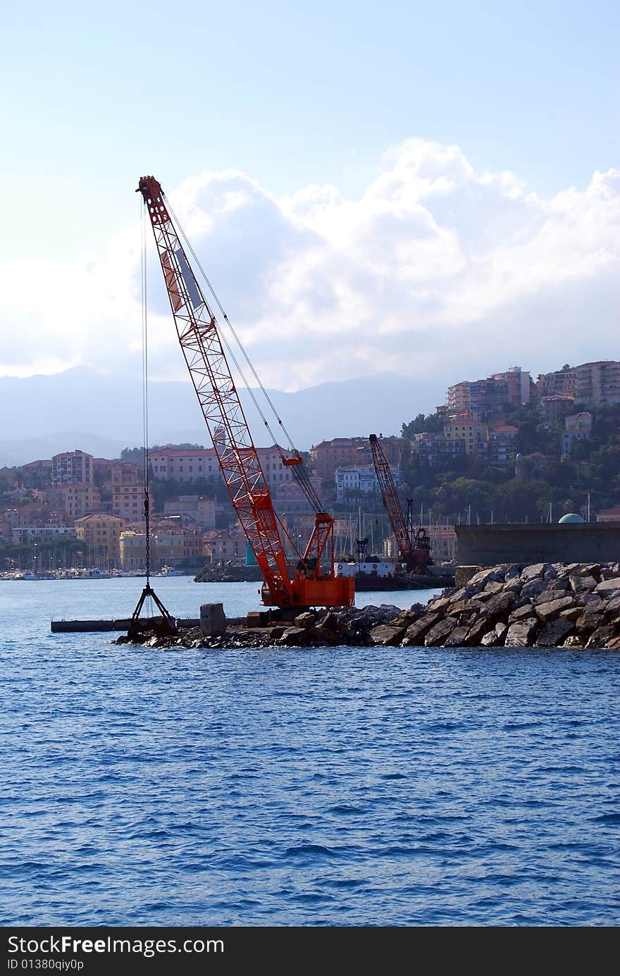 A platform and a crane in a harbour. A platform and a crane in a harbour