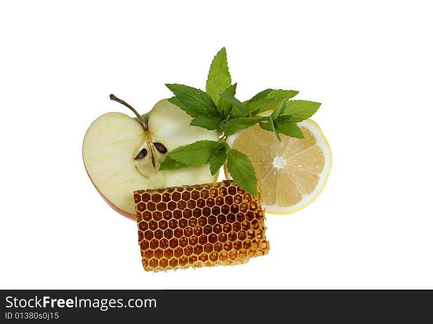 Fruits with mint and honeycomb isolated on white background. Fruits with mint and honeycomb isolated on white background