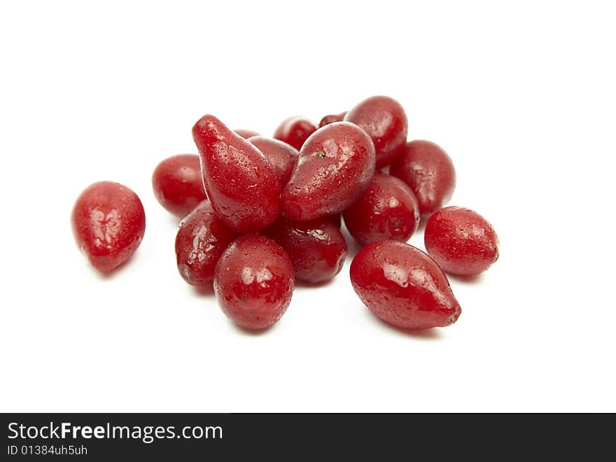 Red berries in droplets of water