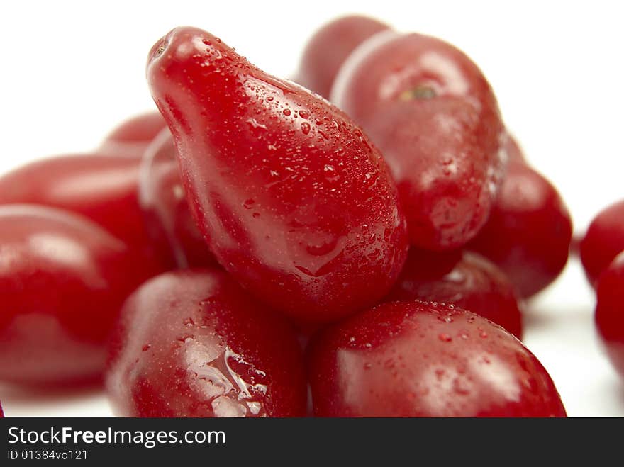 Red berries in droplets of water