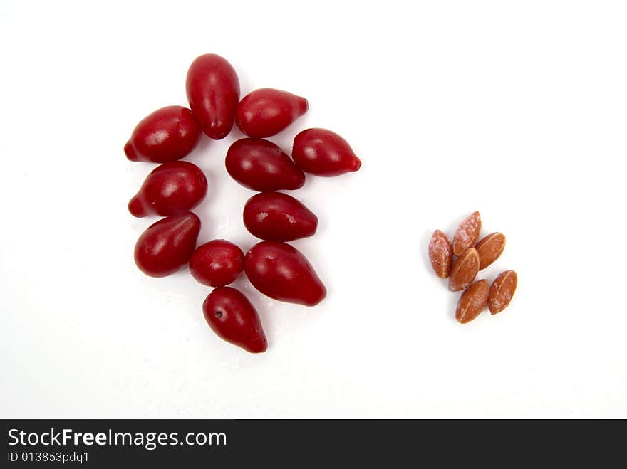 Red exotic berries on white background