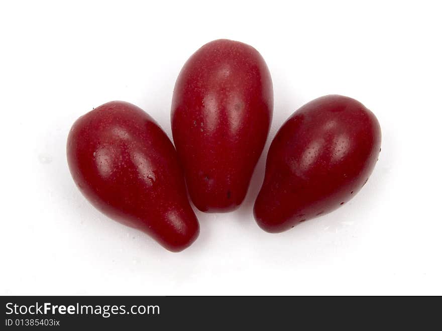 Red exotic berries on white background