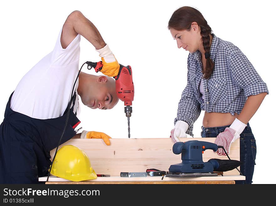 Construction workers at work on white background