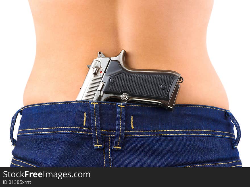 Woman in jeans and gun