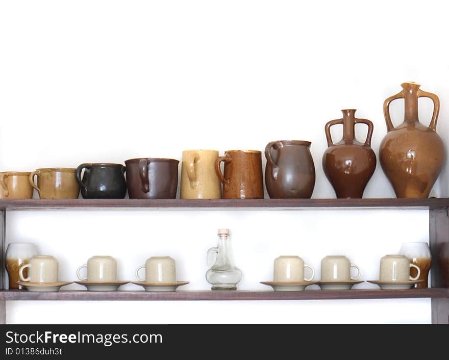 Very old ceramics on the white background. Very old ceramics on the white background