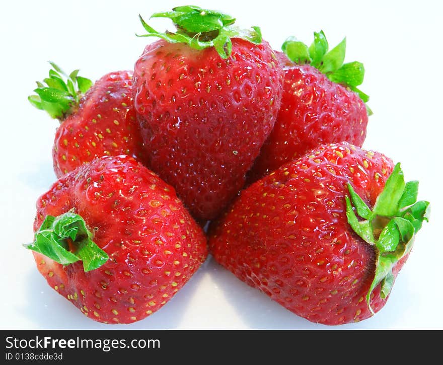 Five strawberrys stacked on a white background. Five strawberrys stacked on a white background