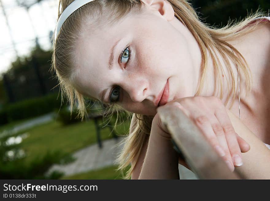 The young woman with a thoughtful sight