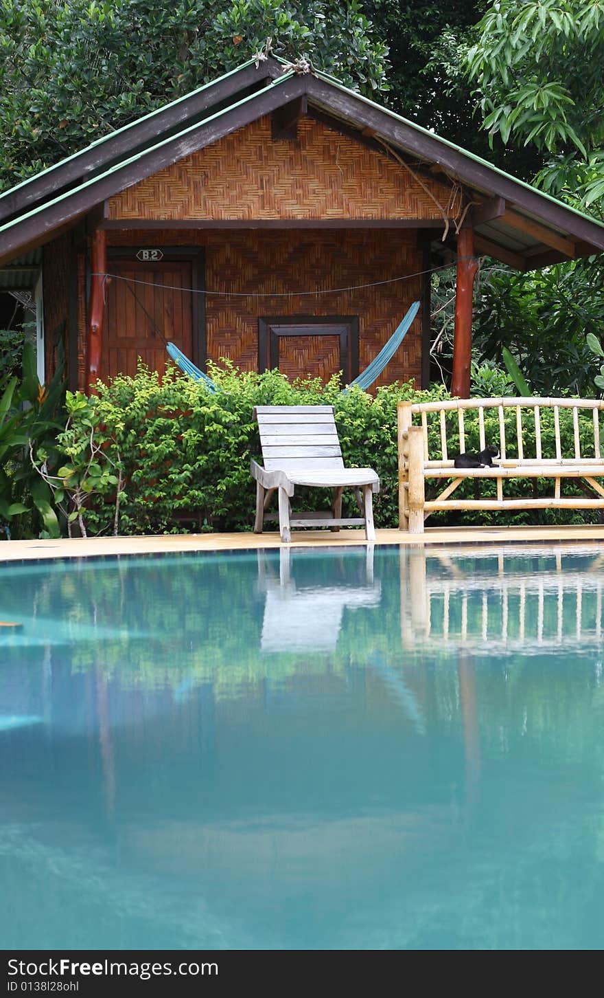 Exterior of a rustic bungalow in Thailand. Exterior of a rustic bungalow in Thailand.