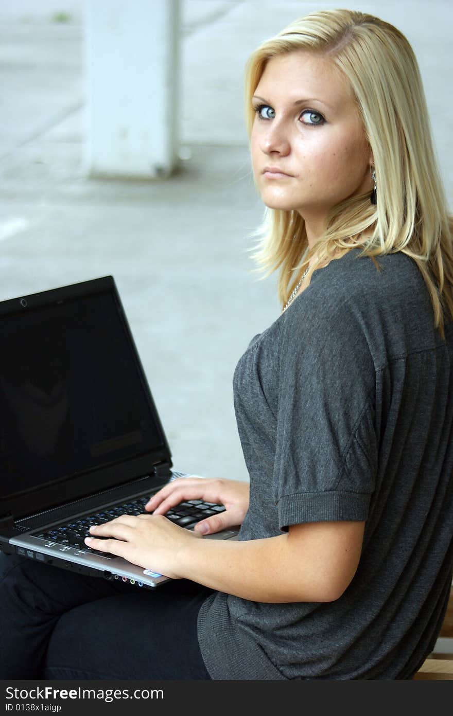 Young, Blonde Girl With Laptop