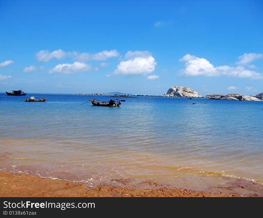 A small island has the golden yellow sand