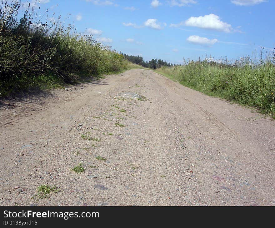 Road through a field