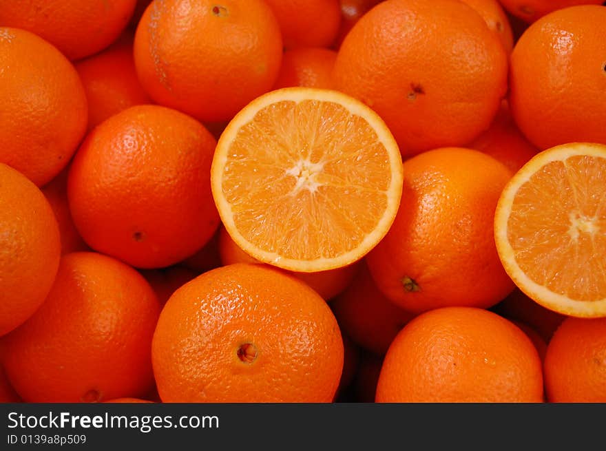 Oranges bunch close up , sliced