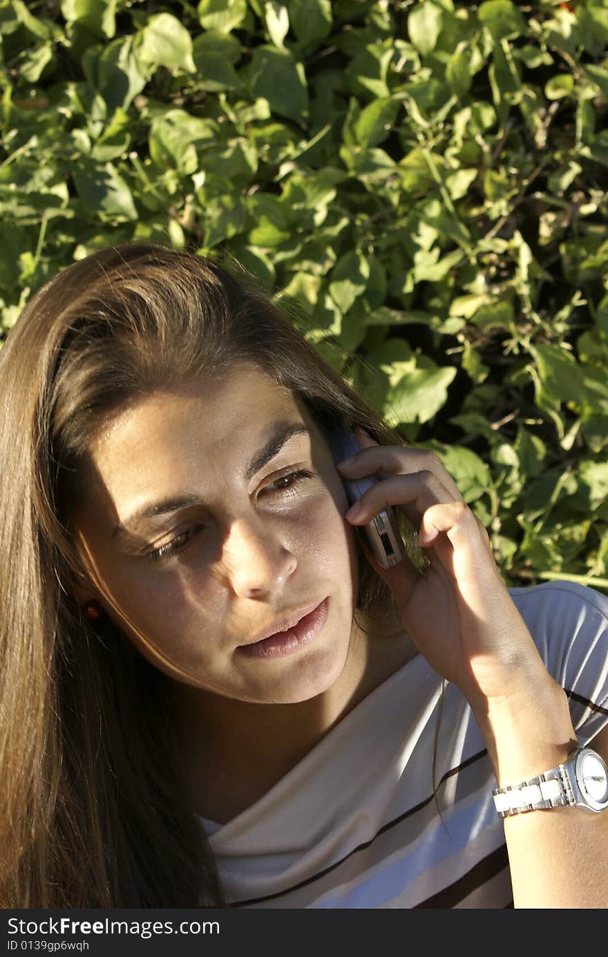 Teen Girl Talking On Her Cell Phone