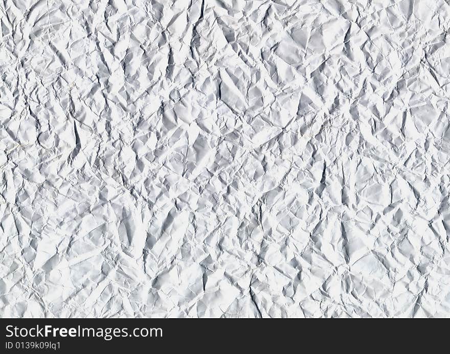 White crushed paper background with copyspace