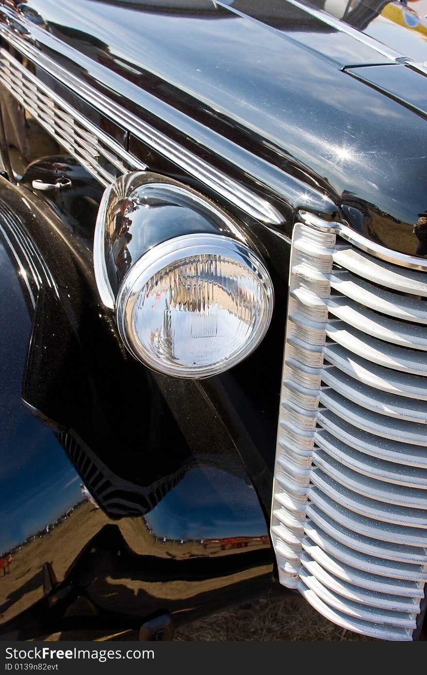 Lattice of a radiator and headlights of the ancient