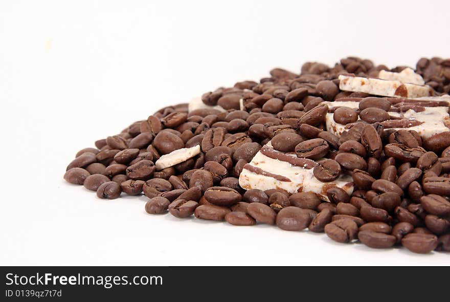 Coffee and Toffee flavored candy spilled with whole roasted coffee beans. Coffee and Toffee flavored candy spilled with whole roasted coffee beans