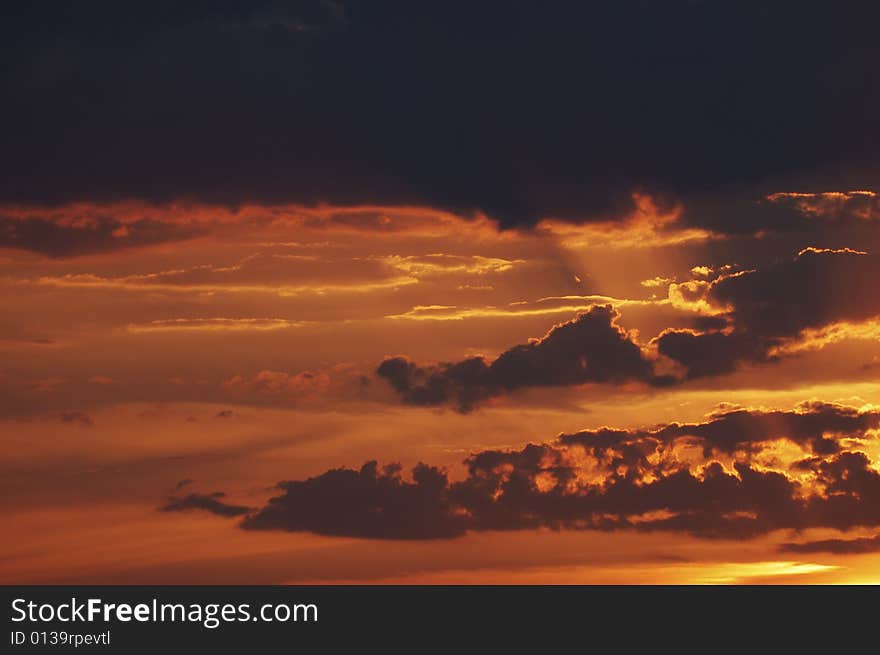 Setting sun magnificence, cloud as if by final optical fiber ignition. Setting sun magnificence, cloud as if by final optical fiber ignition