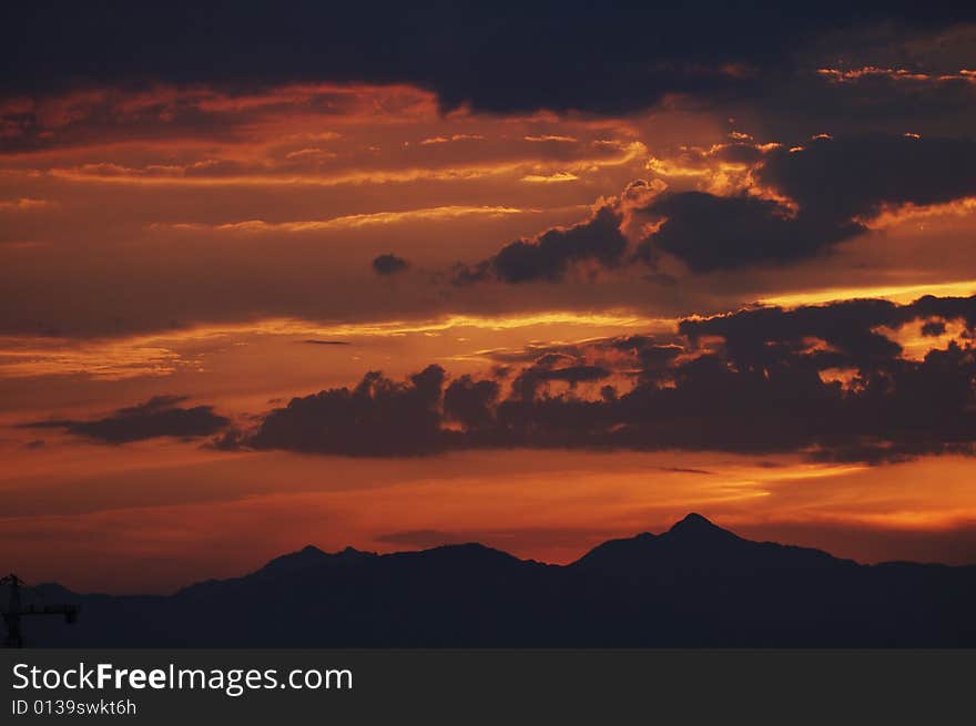 Setting sun magnificence, cloud as if by final optical fiber ignition. Setting sun magnificence, cloud as if by final optical fiber ignition