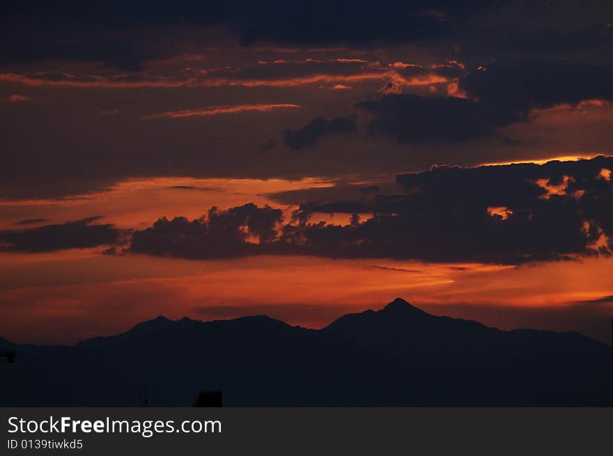 Setting sun magnificence, cloud as if by final optical fiber ignition. Setting sun magnificence, cloud as if by final optical fiber ignition