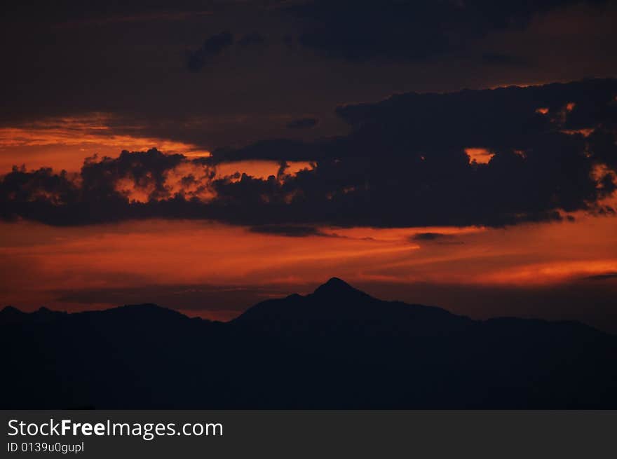 Setting sun magnificence, cloud as if by final optical fiber ignition. Setting sun magnificence, cloud as if by final optical fiber ignition