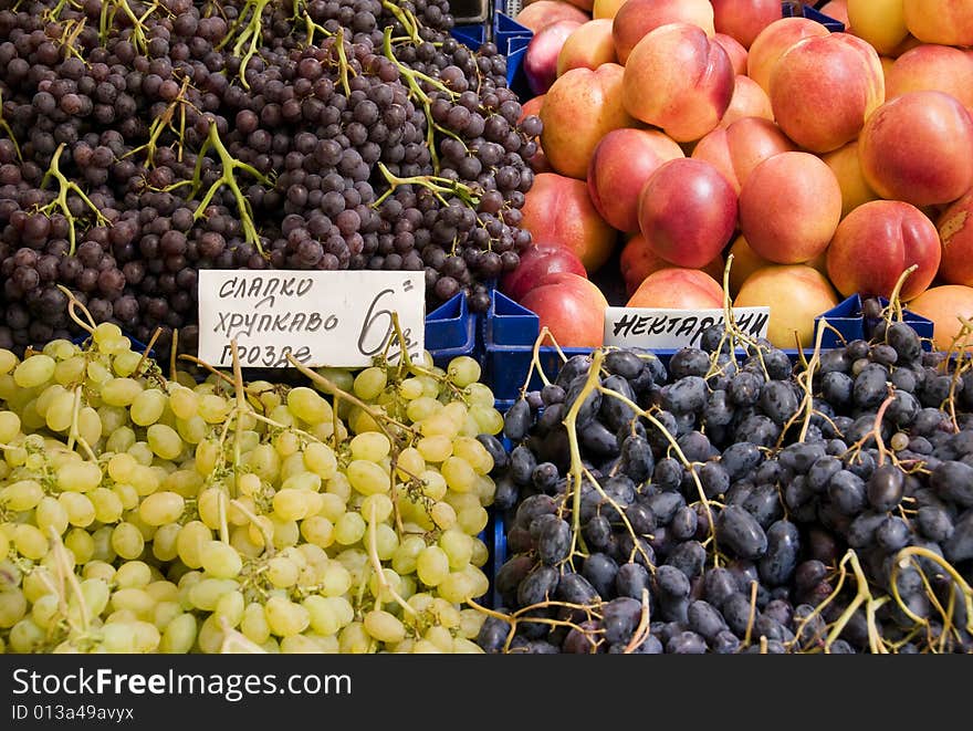 Grapes and nectarines on a market. Grapes and nectarines on a market