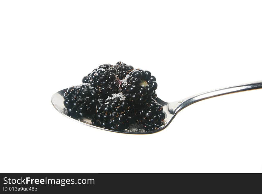 Blackberries on spoon