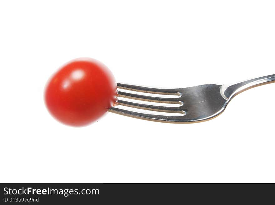 Tomato on fork