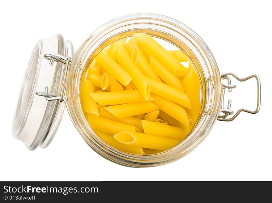 Pasta in glass can on a white background