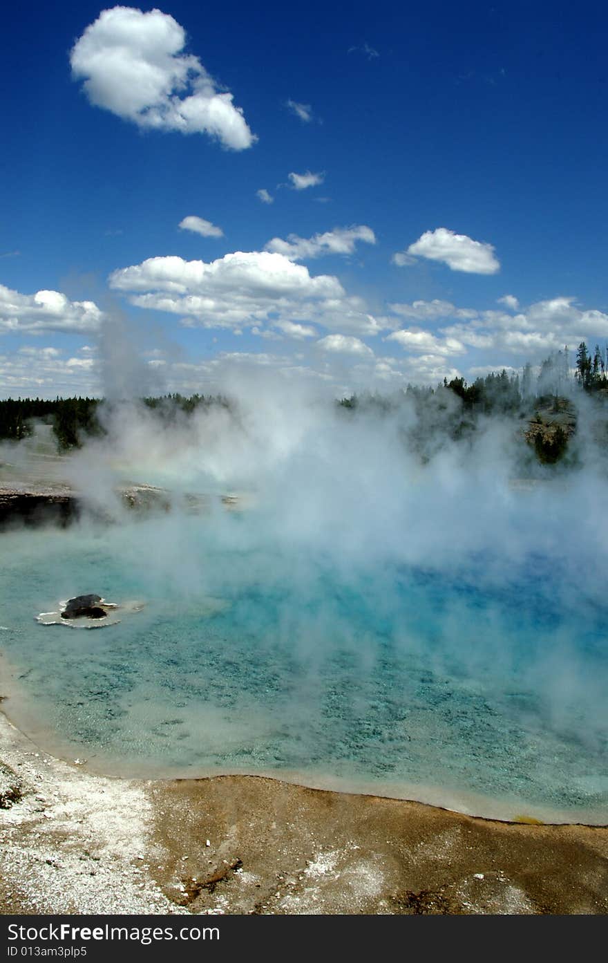 Colorful Yellowstone geyser basin, early summer