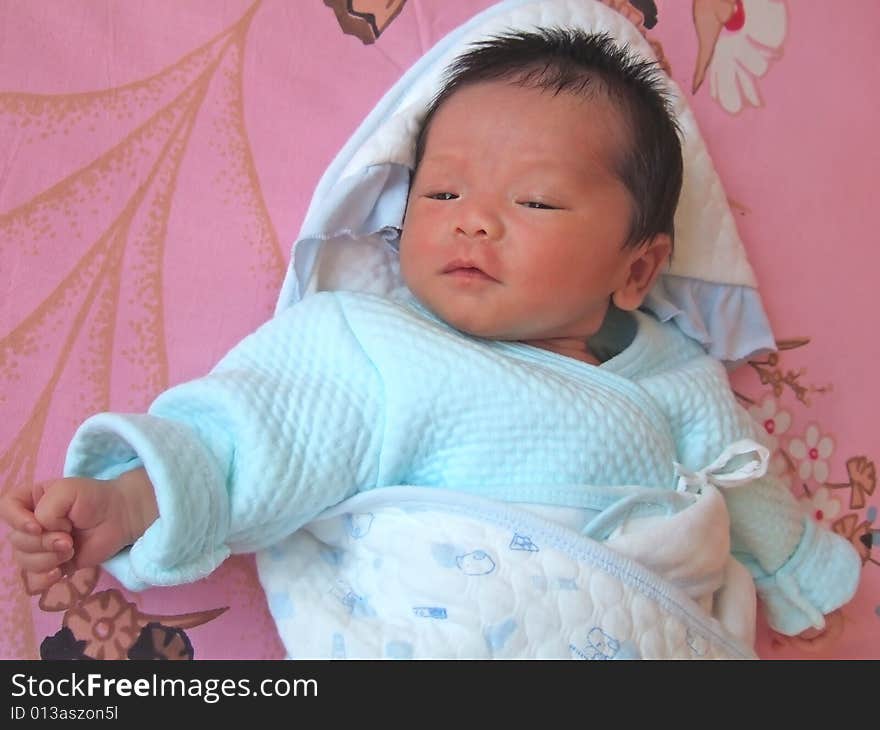 Lovely Baby on a bed